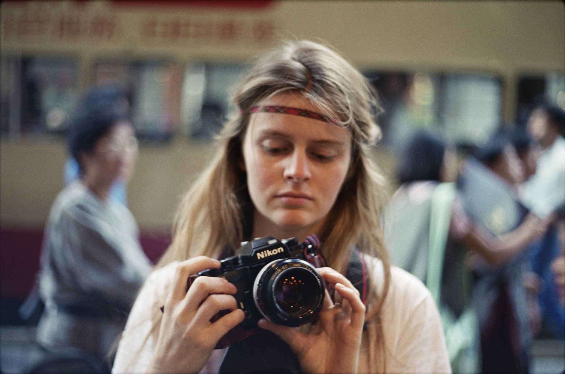 Corinne holding a camera